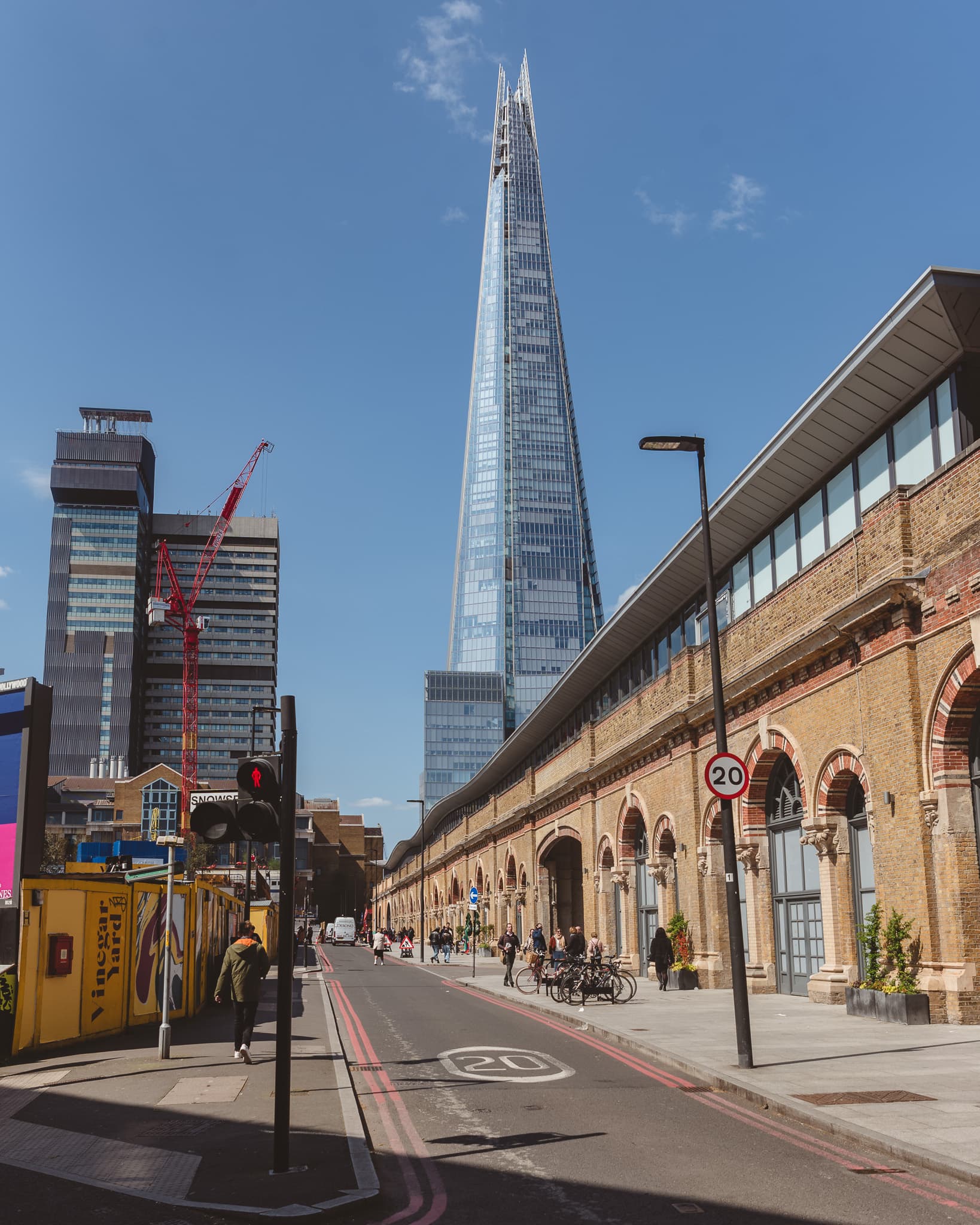 The Shard rising above the railway arches and warehouses of Bermondsey Street.