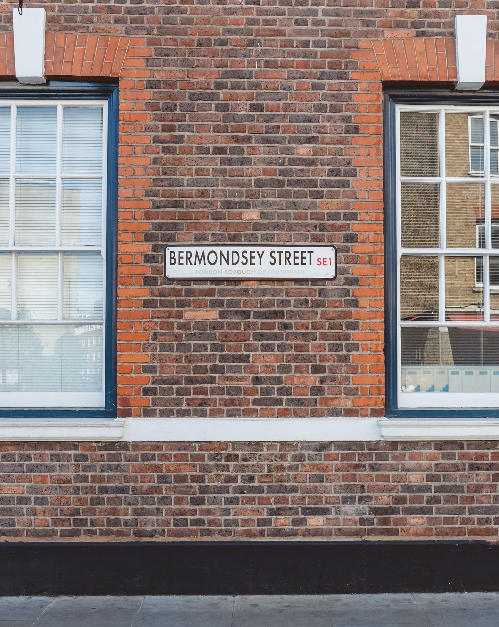 The Bermondsey Street SE1 street sign mounted on a brick wall.