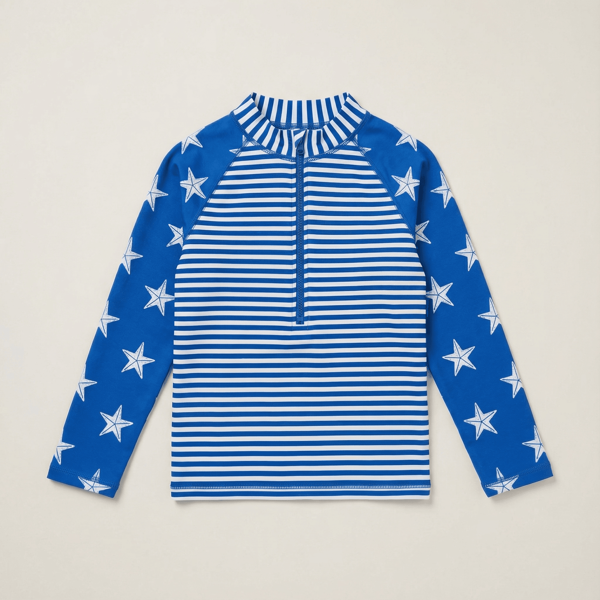 EarthCove kids' long-sleeve rash guard in star print, flat lay